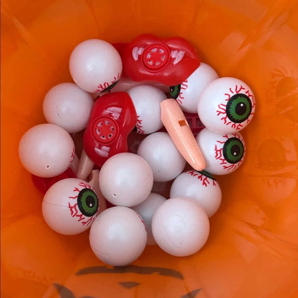 Orange Halloween Pumpkin Bucket with bonus whistles and beer pong eye balls